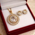 Elegant AD Stone Gold Finish Pendant Set for women.