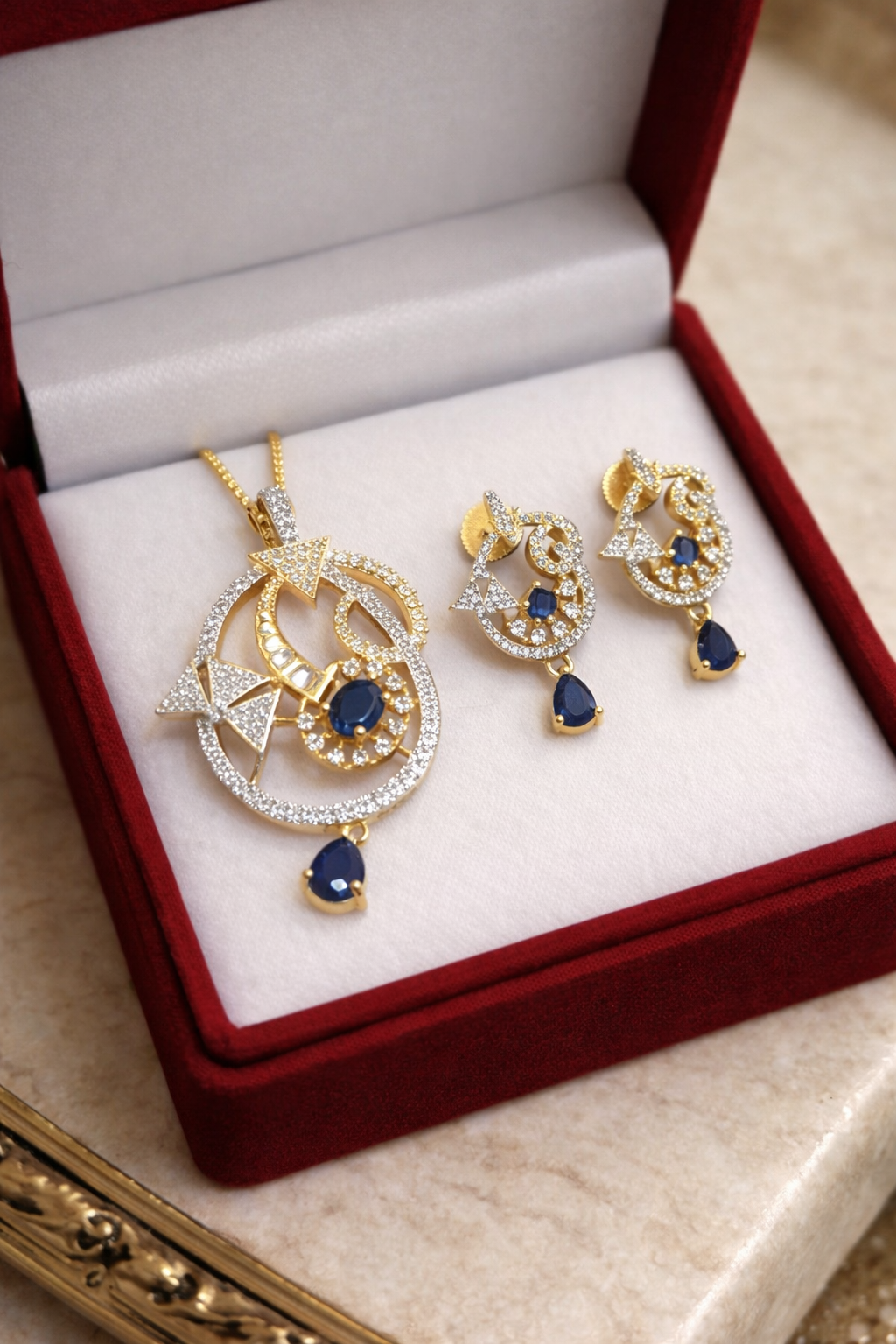 file_00000000d838720983eb1f44d32ccdd6 Designer Blue AD Stone Gold Finish Pendant Set. - Image 1