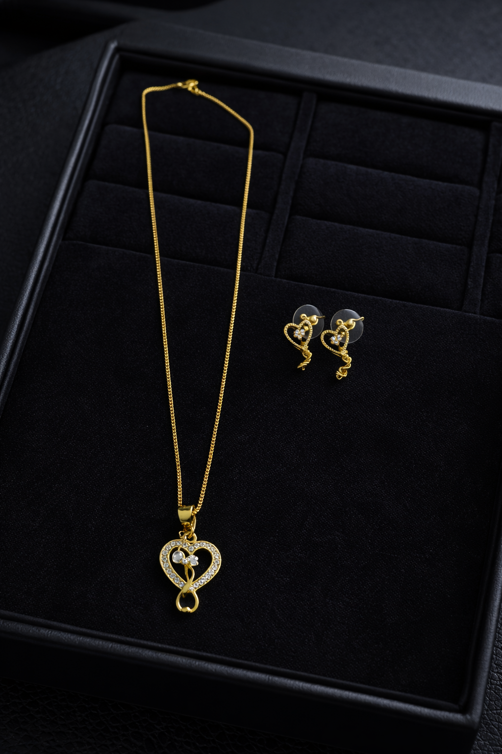 file_00000000c2dc720980f48204235d751c Golden Love Knot Heart Pendant Set ✨ - Image 1